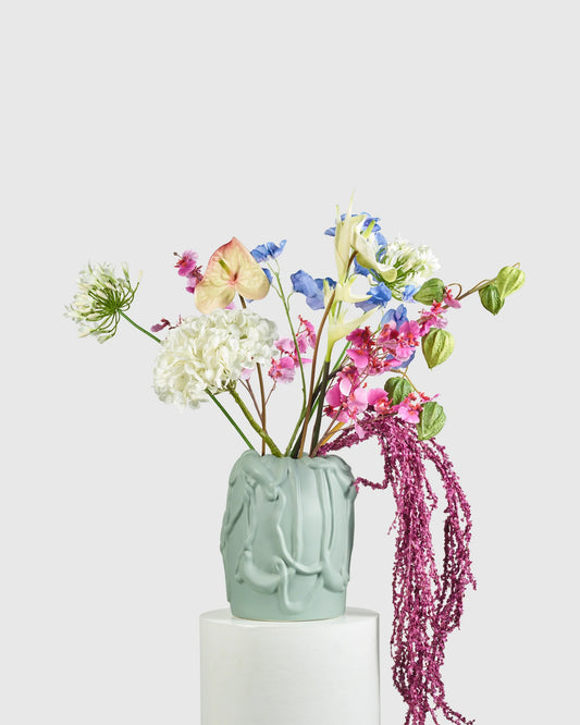 Raawii Jam Vase Seagrass styled with a Flowerism bouquet