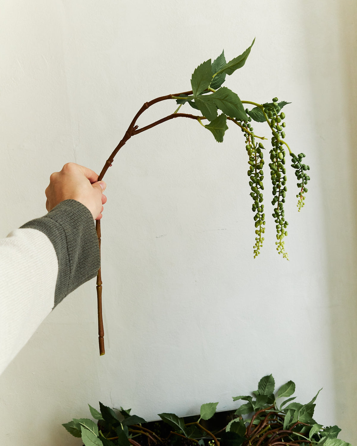 Pokeweed - Green – held in hand